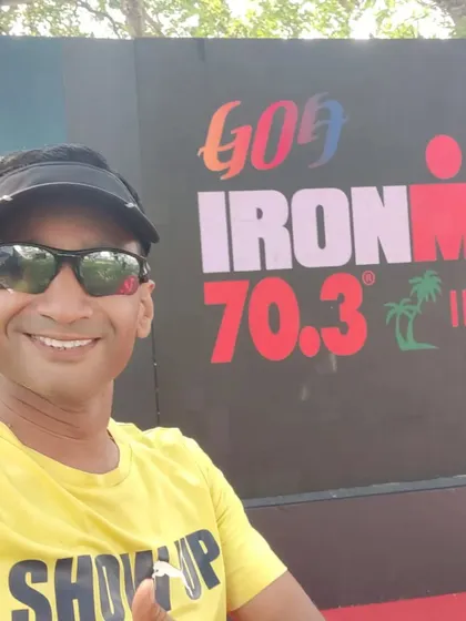 Big cheers for Pravin Gupta for conquering Ironman 70.3 Goa. A selfie from the event, showing his "Show Up" spirit.