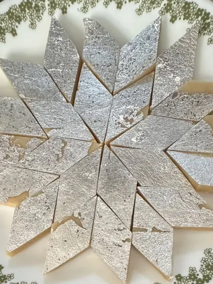 Our homemade Kaju Katli is a timeless classic, loved by everyone. Each piece is made with premium cashews and has the perfect melt in your mouth texture, topped with silver varq.