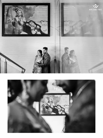 A creative black and white shot using reflections to frame the couple. The artwork in the background adds another layer to their story, creating a photo rich with meaning.