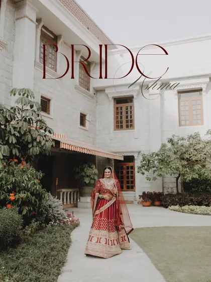 A regal bridal portrait in front of a beautiful heritage building, showcasing the bride's elegance and the grandeur of the location.