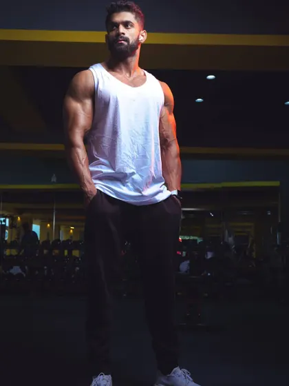 I built myself through years of relentless effort. This photo, taken in the gym, reflects the quiet confidence that comes from achieving your fitness goals.