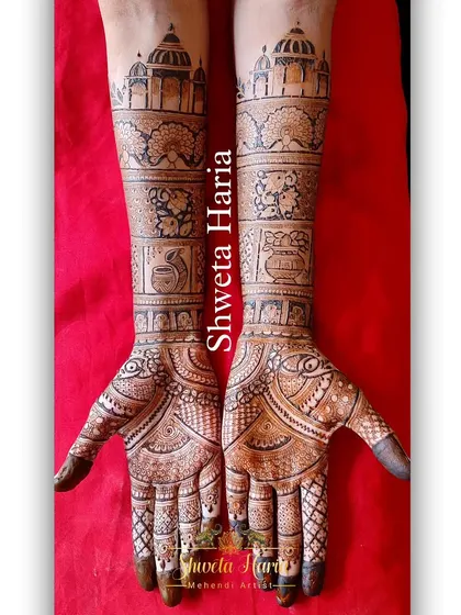 A minimal yet complete bridal design featuring traditional elements like the dhol, shehnai, and kalash, perfect for a bride who wants elegance without overwhelming detail.