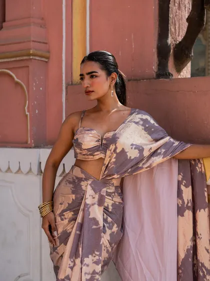 A closer look at the beautiful print and draping of our pastel pink saree.