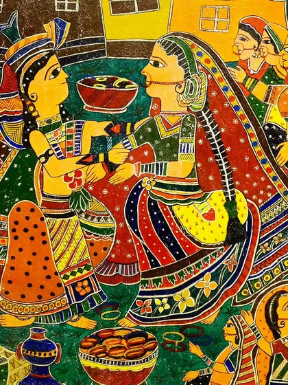 A beautiful Madhubani painting depicting a traditional ceremony. This style is known for its intricate patterns, vibrant colors, and themes from nature and mythology.