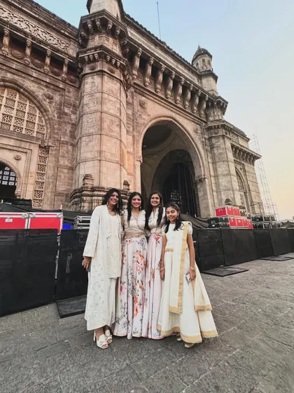 Our team and students posing proudly in front of the Gateway of India after our performance.