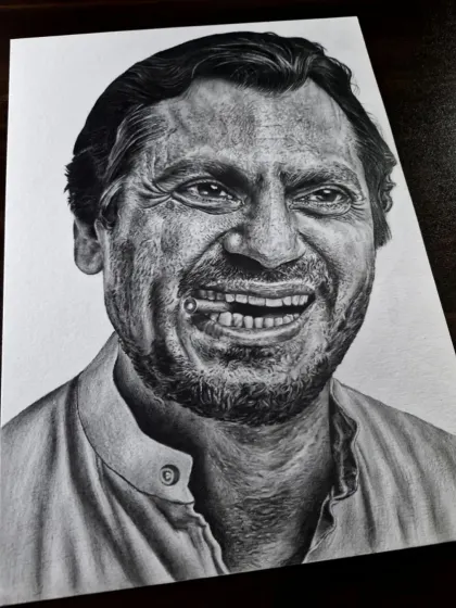 This realistic portrait of actor Nawazuddin Siddiqui was a personal project. I spent hours on the details, from the texture of his skin to the intensity in his eyes, to create a powerful and lifelike charcoal drawing.
