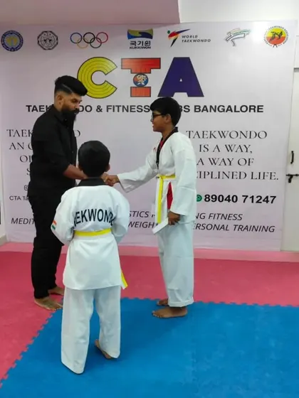 A handshake between students.