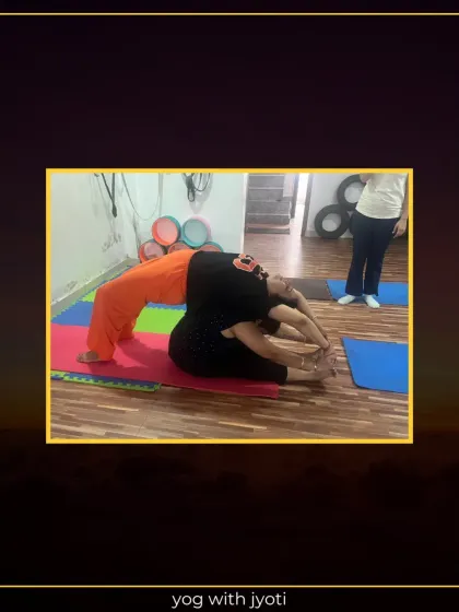 A beautiful partner backbend where one person's Chakrasana (Wheel Pose) is supported by the other's Paschimottanasana (Seated Forward Bend).