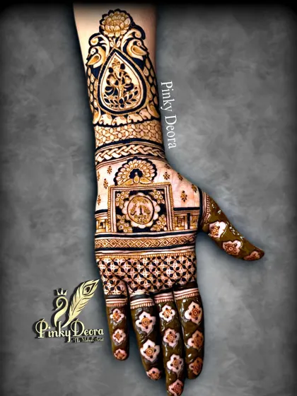 New patterns, new charm, same love for mehndi. This design features intricate geometric patterns and traditional motifs, creating a full and balanced look.