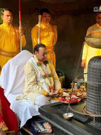 A devotee performs puja at the Shiva temple on Maha Shivratri morning. We provide opportunities for everyone to personally participate in the worship and make their offerings.