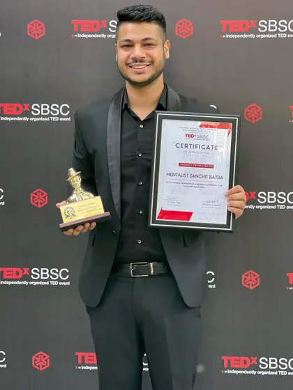 Holding my certificate and award after my performance and talk at a TEDx event. It was an amazing opportunity to share my passion.