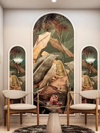 A cozy and elegant seating area in a passageway. The arched wall panels with tropical wallpaper create a beautiful backdrop for the two modern chairs, turning a simple corridor into a stylish nook.