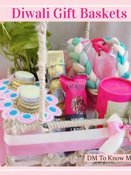 A slightly different angle of the pink-themed basket, showing the braided handle and the variety of items inside.