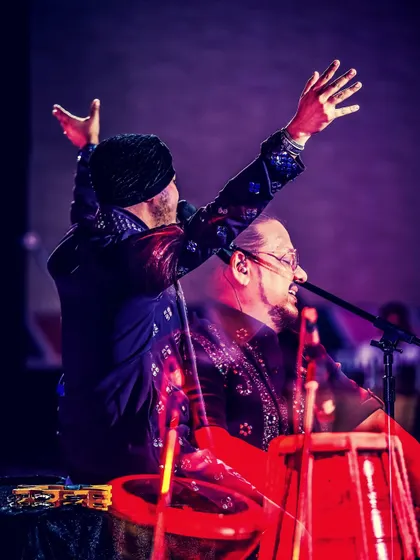 A dynamic shot capturing the energy of our vocalists on stage. We bring a full concert experience to private and corporate events.