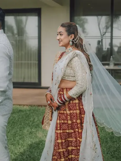 The 'first look' moment, full of anticipation and emotion. We capture the groom waiting and the bride approaching, telling a small story in a single frame.