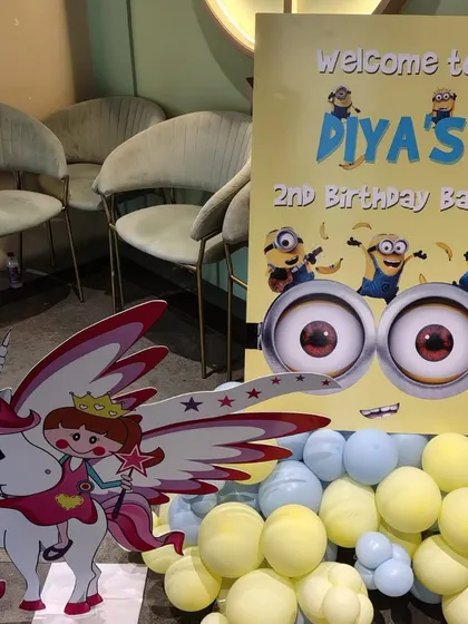 A custom welcome sign for Diya's 2nd birthday bash, featuring the lovable Minions. This is a great example of how we tie all the decor elements together, starting from the entrance.
