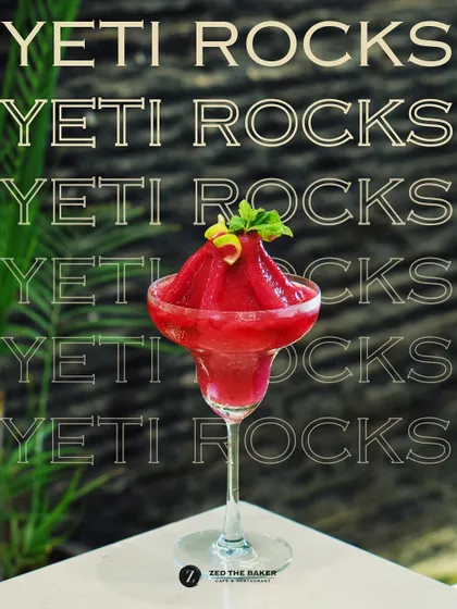 Meet Yeti Rocks, my signature frozen berry mocktail. It's a brain-freezing, bold, and refreshing drink served in a margarita glass, perfect for beating the heat.