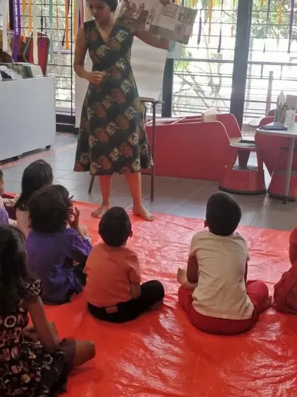 A different view of the storytelling session with Priya Kuriyan, showing the rapt attention of the kids.
