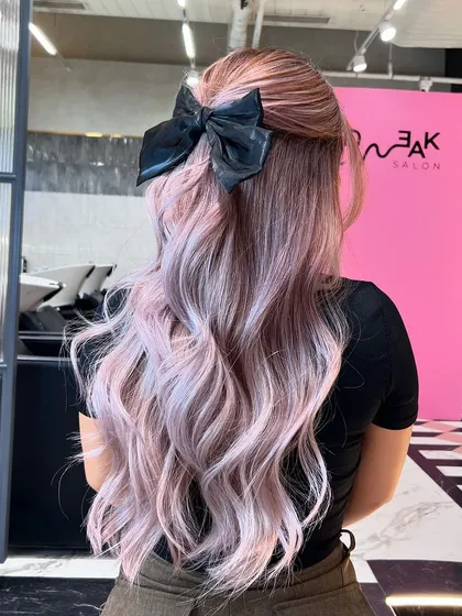Another look at the 'Platinum Lily' hair, showing the full length and the beautiful, wavy texture that makes the color pop.