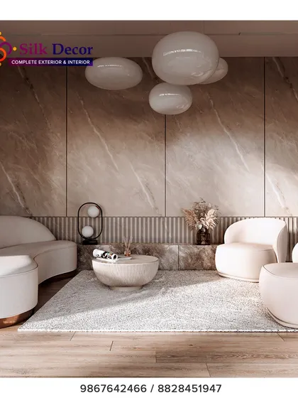 This living space showcases our expertise in creating ultra-modern and sculptural furniture. The curved white sofa and matching armchairs are custom-designed to create a soft, inviting, and sophisticated seating area. This is an example of how we can tailor unique silhouettes to fit a specific design vision.