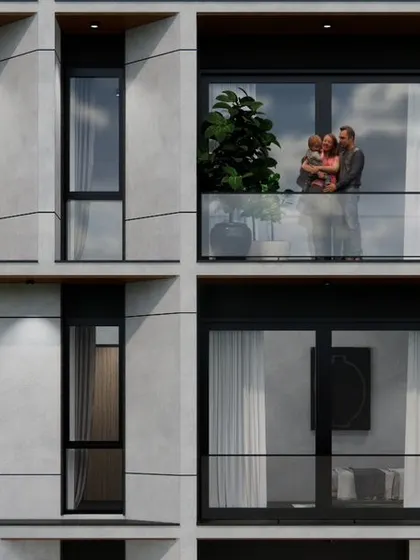 A detail of the chamfered concrete facade, showing how we use subtle geometric shifts to create visual interest and soften the building's verticality.