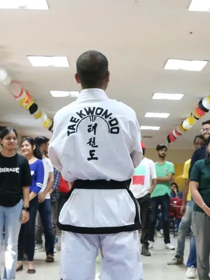 Addressing students at a self-defense workshop. My goal is to teach not just techniques, but also awareness and the mindset to handle difficult situations.