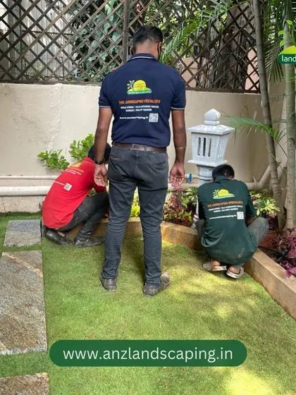 An identical view of our team's detailed work on the planting, a testament to their focus and dedication.