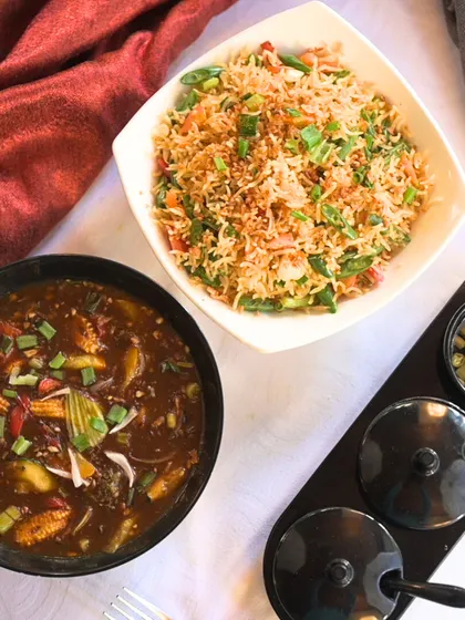Get your taste buds dancing with Burnt Garlic Fried Rice and Exotic Vegetable in Hunan Sauce.