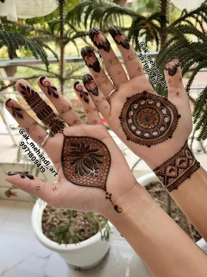 A special design for the Teej festival, featuring a lotus motif on one hand and a mandala on the other. It's a beautiful blend of modern and traditional styles.