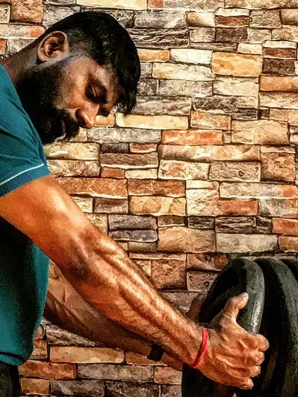 The focus it takes to lift heavy weights and build muscle.