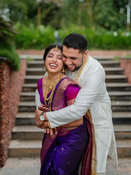 A candid shot filled with infectious laughter. We believe the best portraits are the ones where you forget we are even there, allowing your true personalities to shine.