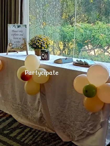 A guest book table for Ekaksh's safari party. We encourage guests to take a photo and leave a note, creating a wonderful keepsake for the family to look back on.