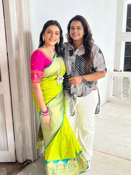 A classic portrait with Shivani. She looks stunning in her traditional attire, with makeup that is bright and festive.