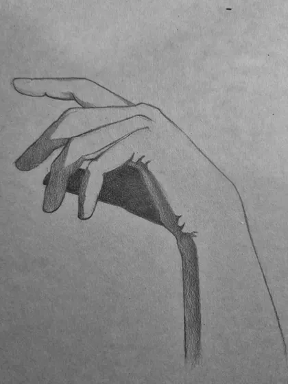 The blocking-in stage of the hand study, where the main shadow shapes are established.