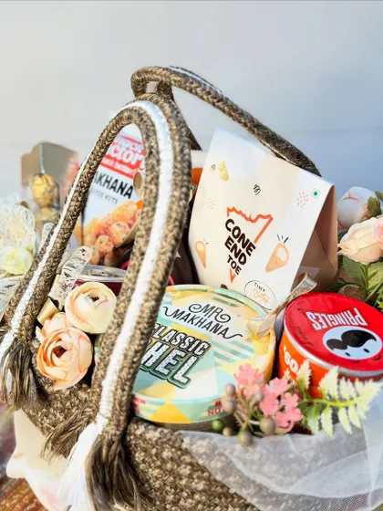 These goodie baskets are perfect as wedding return favors or room hampers for your guests. Filled with snacks and treats, and packed in a stylish and reusable jute bag, they are a warm and welcoming gesture.