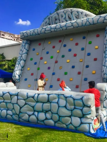 An inflatable rock climbing wall for the more adventurous guests. I ensure all equipment is safe and supervised, so everyone can challenge themselves and have fun.