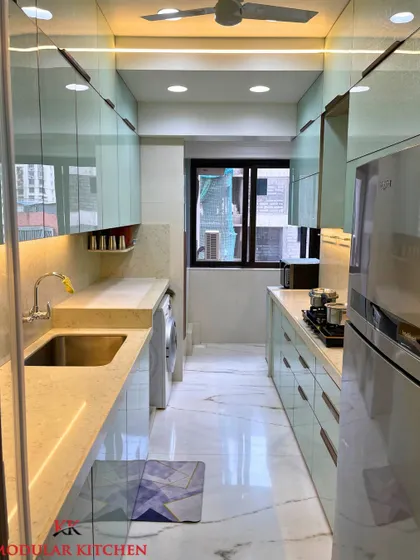 A full-length view of the parallel kitchen in Ghatkopar, showing the seamless flow and ample walking space.