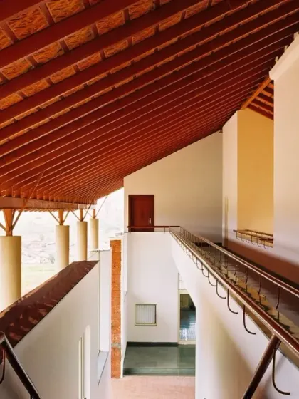 In response to Goa's heavy monsoons, I designed this office under a single, large canopy-like roof. The deep verandahs and use of local laterite stone are examples of my climate-responsive approach, ensuring the building belongs to its place.