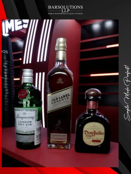 A lineup of the premium spirits we served at the Diljit Dosanjh concert, including Johnnie Walker Gold Label, Tanqueray, and Don Julio.