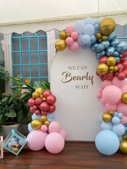 A wider view of the "Bearly Wait" baby shower decor, showing the "BABY" blocks filled with smaller balloons. This theme is great for gender-neutral or gender-reveal parties.