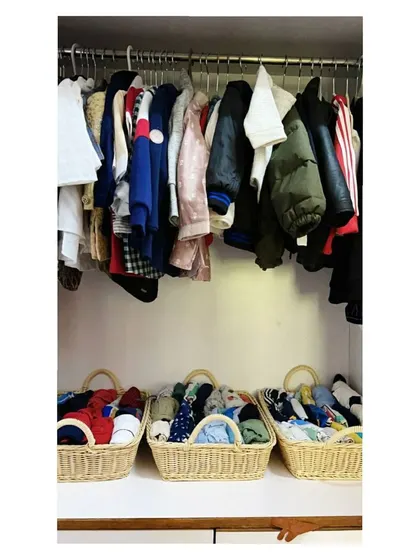 Using simple wicker baskets is a great way to organize kids' clothes. They are easy to pull out, and you can teach your child to put their own folded clothes away.