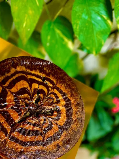 It was raining marble cakes this week. Eggless vanilla-chocolate whole wheat marble cakes like this one are very popular for birthday celebrations at school.