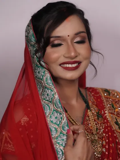 A serene moment captured, with eyes closed to show the soft, blended eyeshadow work. The look is traditional yet feels light and comfortable.