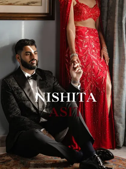 A close-up of the stylish groom, with the bride in a stunning red gown.