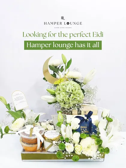 Eid celebrations deserve a touch of grandeur. This hamper, overflowing with fresh white and green florals and festive treats, is arranged in a beautiful tray and accented with a golden crescent moon to make your Eidi truly special.