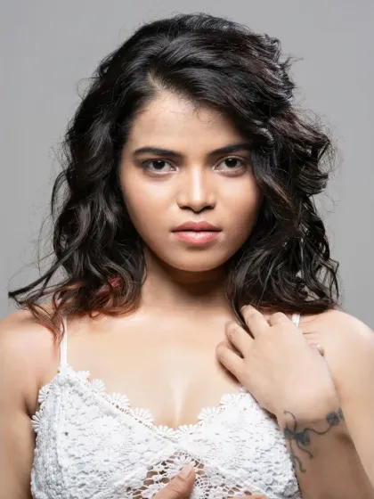 A simple and beautiful beauty portrait. This showcases a natural, fresh-faced look with soft, textured hair, focusing on the model's features.