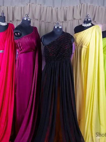A lineup of our popular one-shoulder flying gowns. With so many colors to choose from, you can find the perfect one to match your photoshoot theme.
