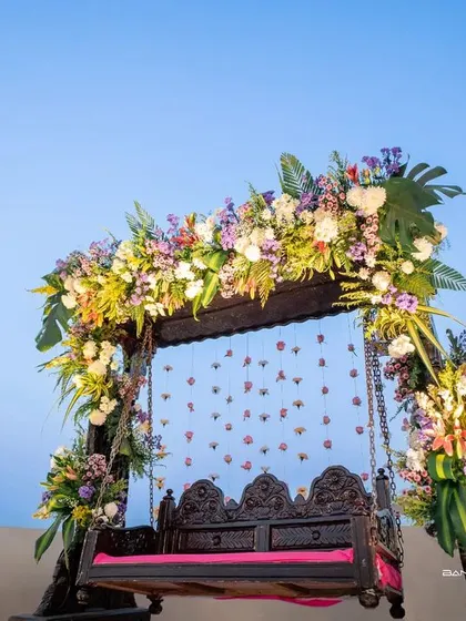 The beautiful floral decor for a Haldi or Mehendi ceremony. I also focus on the details that create the atmosphere for your special day.