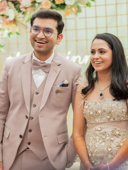 A candid shot of the newly engaged couple, their faces lit up with happiness. It's a perfect capture of the joy that fills the room after a 'yes'.