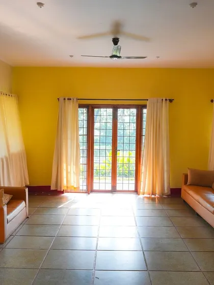 This is one of the spacious living areas within our accommodation buildings, offering a simple and functional space for teams to congregate or unwind.